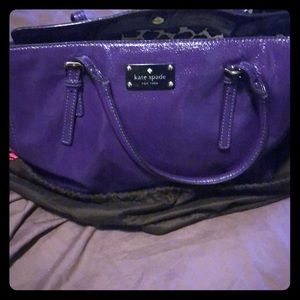 Purple, top handle Kate Spade purse. With dustbag